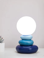 Lampe galets de céramique et globe opalin, trois teintes – Vieste allumée