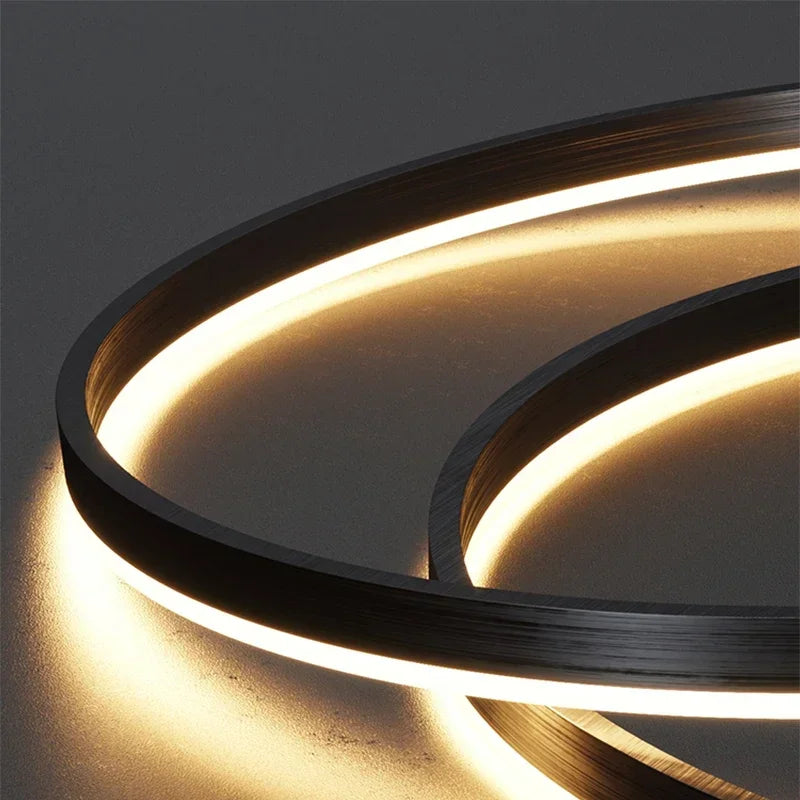 Suspension anneaux LED, de 1 à 5 cercles, quatre finitions – Certaldo dans un intérieur