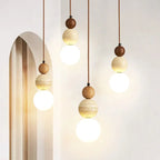 Suspension boule en pierre et bois, style wabi-sabi – Kinosaki dans un intérieur