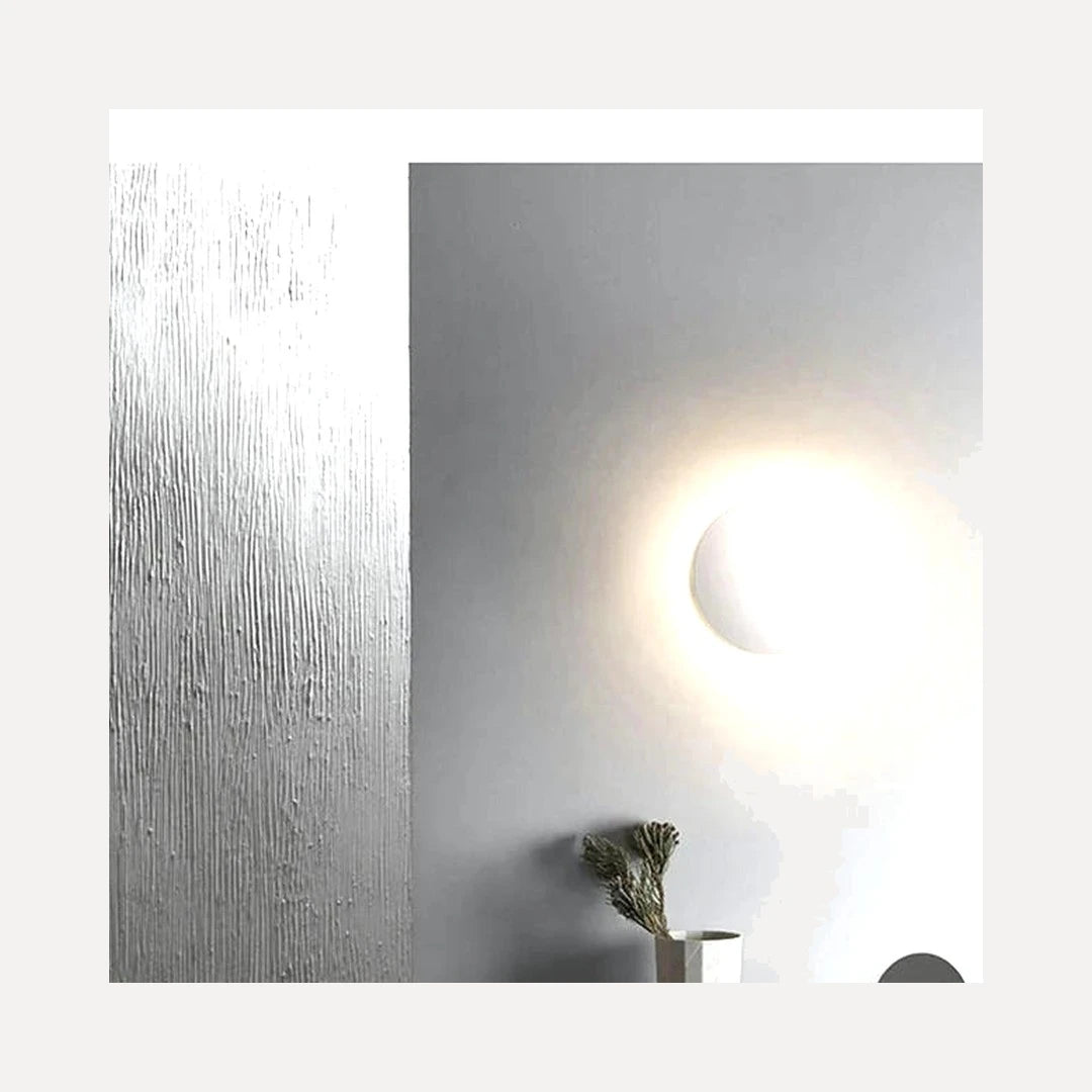 Mesquer, disque d'aluminium et halo de lumière