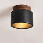 Plafonnier cylindre effet pierre de lave noire et noyer – Agde, sur fond clair