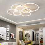 Plafonnier anneaux LED, blanc, noir ou doré – Étoile dans un intérieur