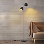 Lampadaire liseuse deux spots orientables, noir et doré – Bidart dans un salon