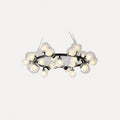 Suspension couronne de globes de verre, dorée ou noire – Marly, sur fond clair