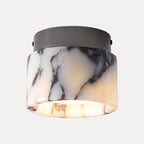 Plafonnier cylindre en marbre naturel et laiton – Pernes, sur fond blanc