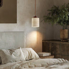 Suspension cylindre en travertin, esprit wabi-sabi – Shima dans un intérieur