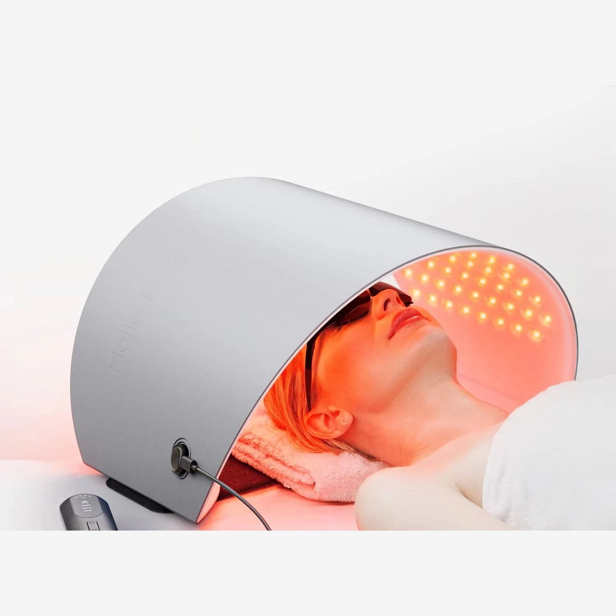 Panneau LED Solstice en arche au-dessus du visage, lumière rouge allumée