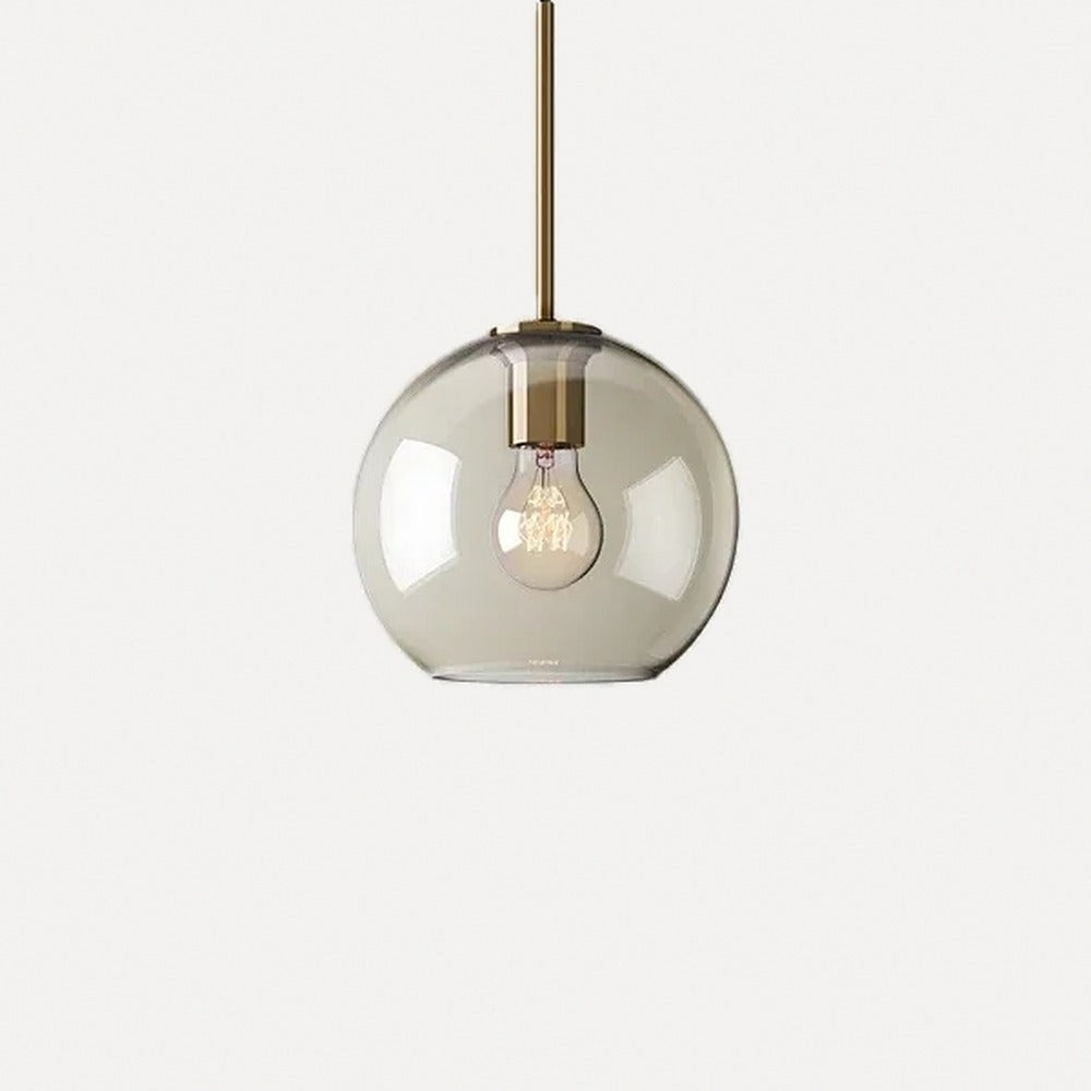 Suspension en verre cognac, cinq formes, monture laiton – Sovana, finition globe Ø 20 cm