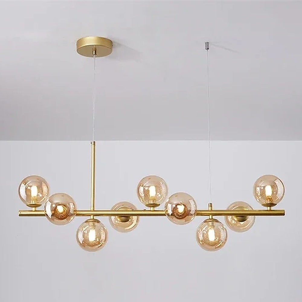 Suspension linéaire à globes de verre, noire ou dorée – Varenna, finition doré, verre ambré / 9 globes, L 83 cm / Blanc chaud