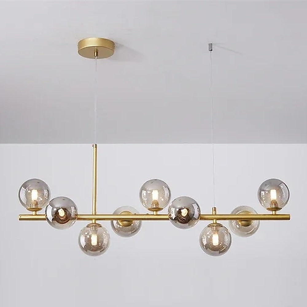 Suspension linéaire à globes de verre, noire ou dorée – Varenna, finition doré, verre gris fumé / 7 globes, L 65 cm