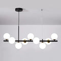 Suspension linéaire à globes de verre, noire ou dorée – Varenna, finition noir, verre opalin / 7 globes, L 65 cm
